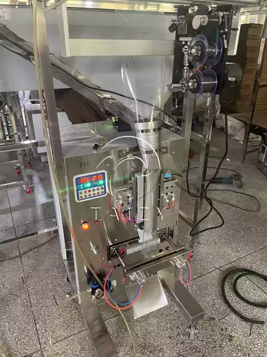 Weigher Pneumatic Packaging Machine Sold To Nigeria For Dried Herb 2 Stainless Steel Food Packing Machine